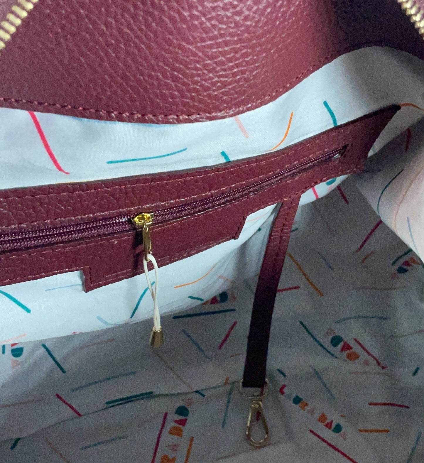 BOTERO vera pelle borgogna e stampa Light Bloom