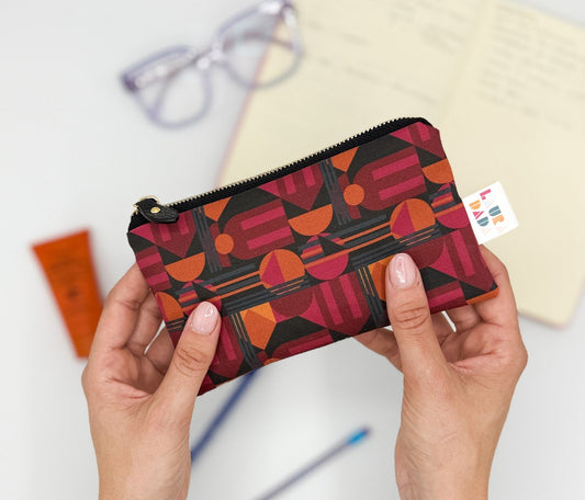 Pochette WONDER MINI con stampa House of the Sun