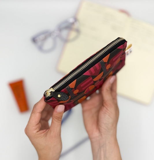 Pochette WONDER MINI con stampa House of the Sun