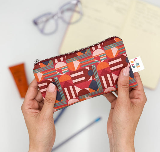 Pochette WONDER MINI con stampa House of the Sun