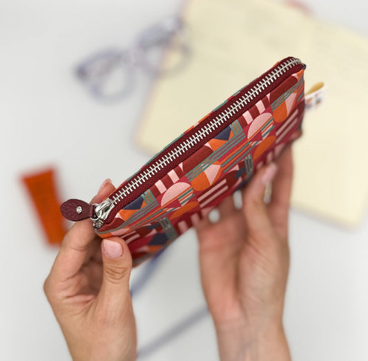 Pochette WONDER MINI con stampa House of the Sun