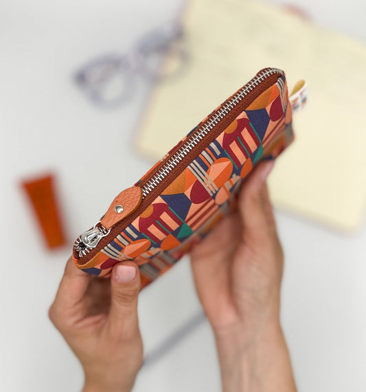 Pochette WONDER MINI con stampa House of the Sun