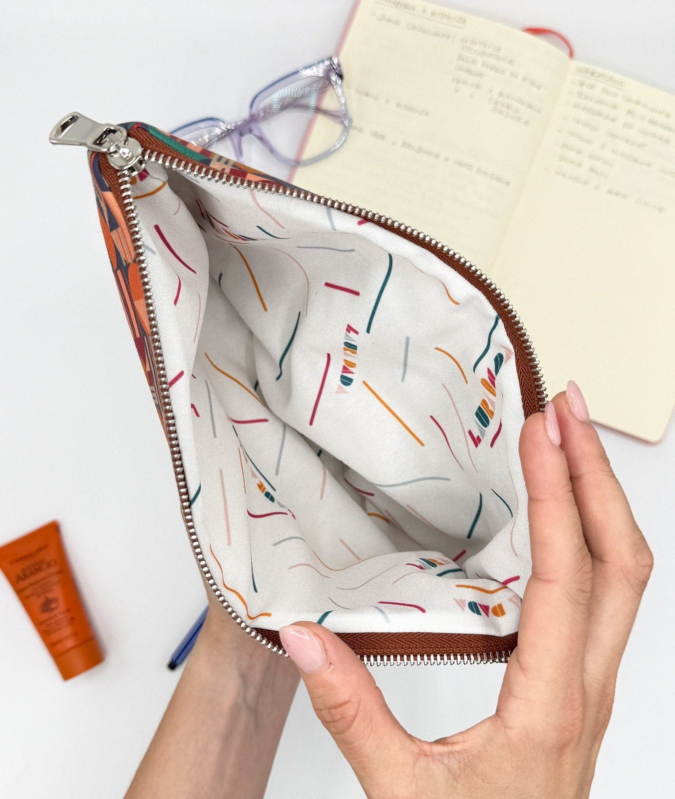 Pochette WONDER midi terracotta e stampa House of the Sun