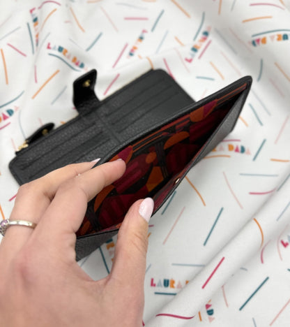 Portafoglio TILDA pelle nera e stampa House of the Sun + Star Box