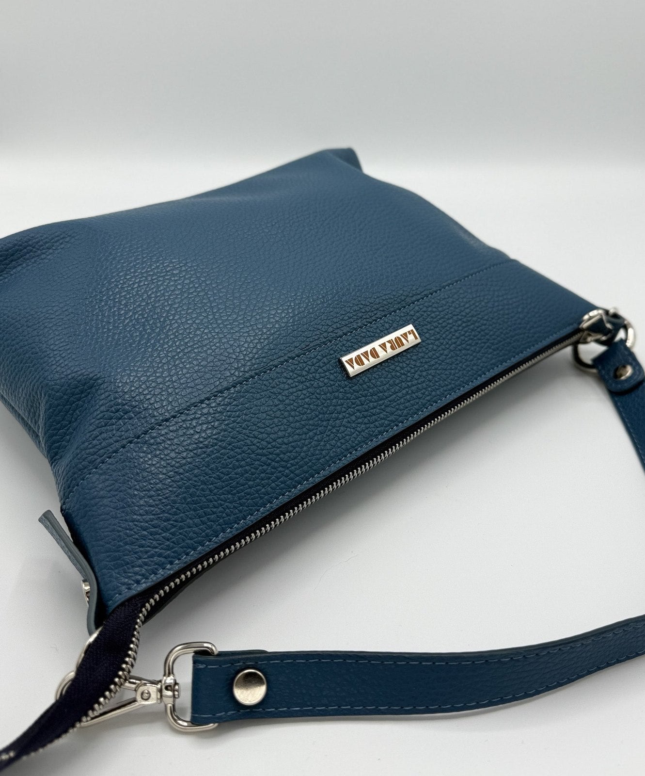 Tracolla MONDRIAN 4in1 monocolore in pelle blu pavone - stampa interna